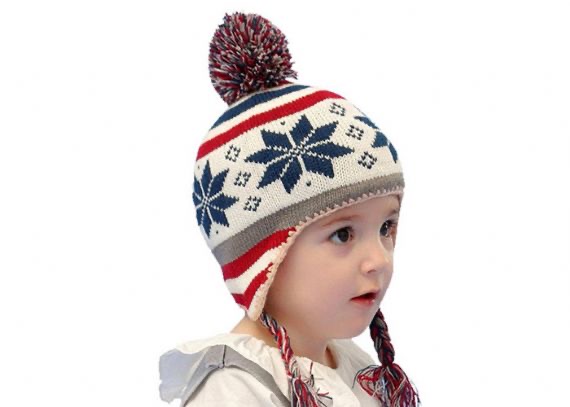 Gorro navideño infantil con pompón de copos de nieve