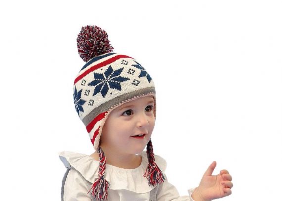 Gorro navideño infantil con pompón de copos de nieve