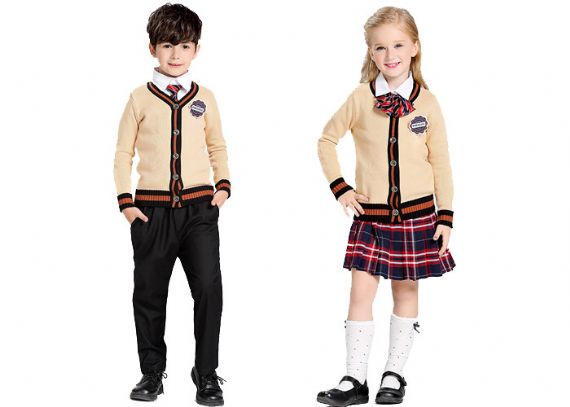 La escuela de los niños amarillos por encargo del algodón viste los suéteres de la rebeca del uniforme